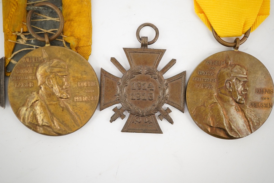 Five German WWI medals; two Second class Iron Crosses, two Kaiser Wilhelm Centenary medals and an Honour Cross 1914-1918. Condition - fair.